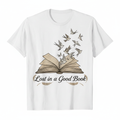 Vintage illustration of open book with pages turning into birds with text Lost in a Good Book